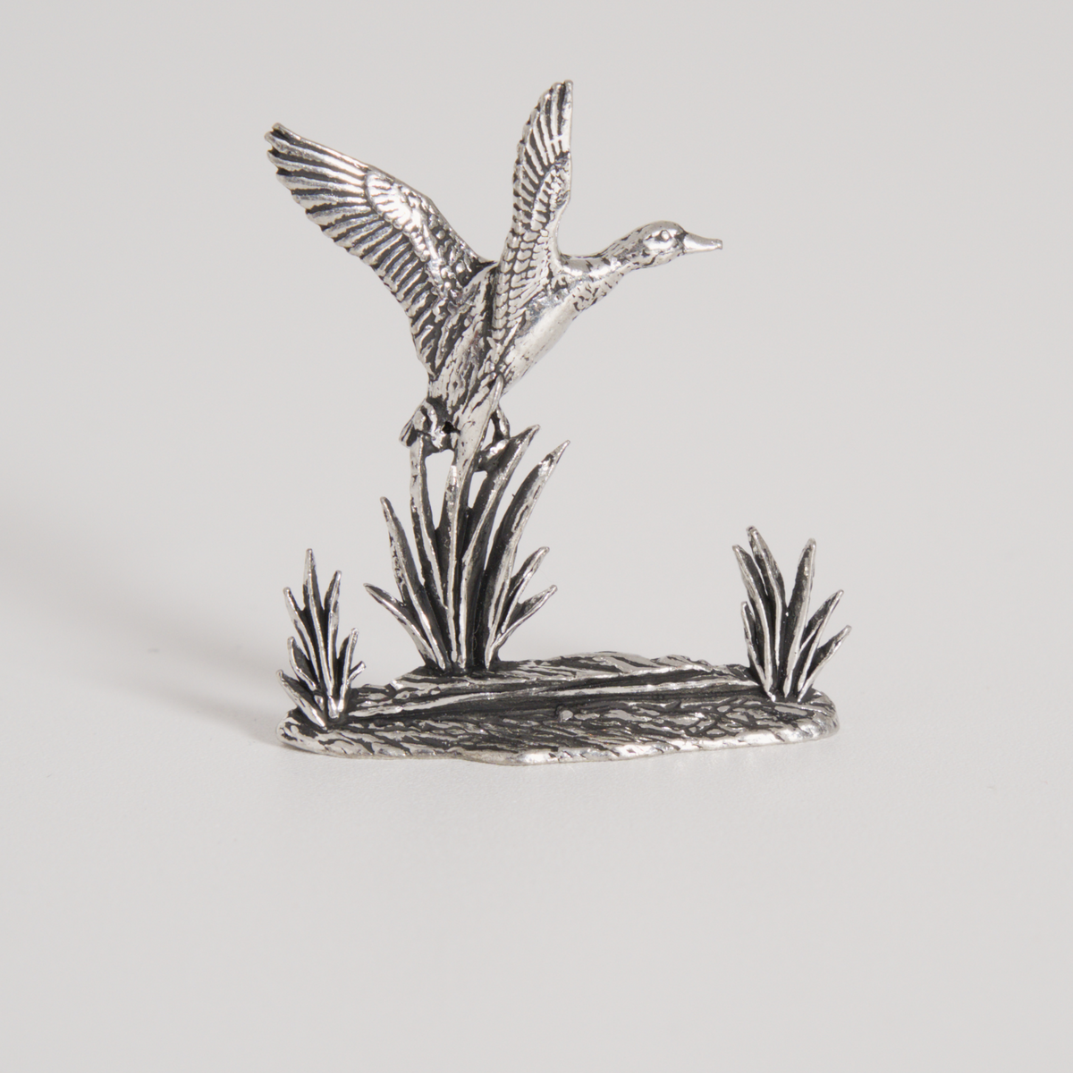 Figurine canard en vol