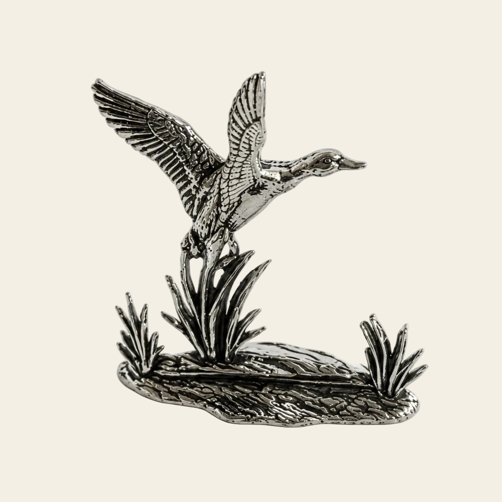 Figurine canard en vol