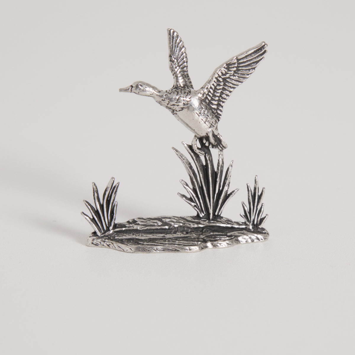 Figurine canard en vol