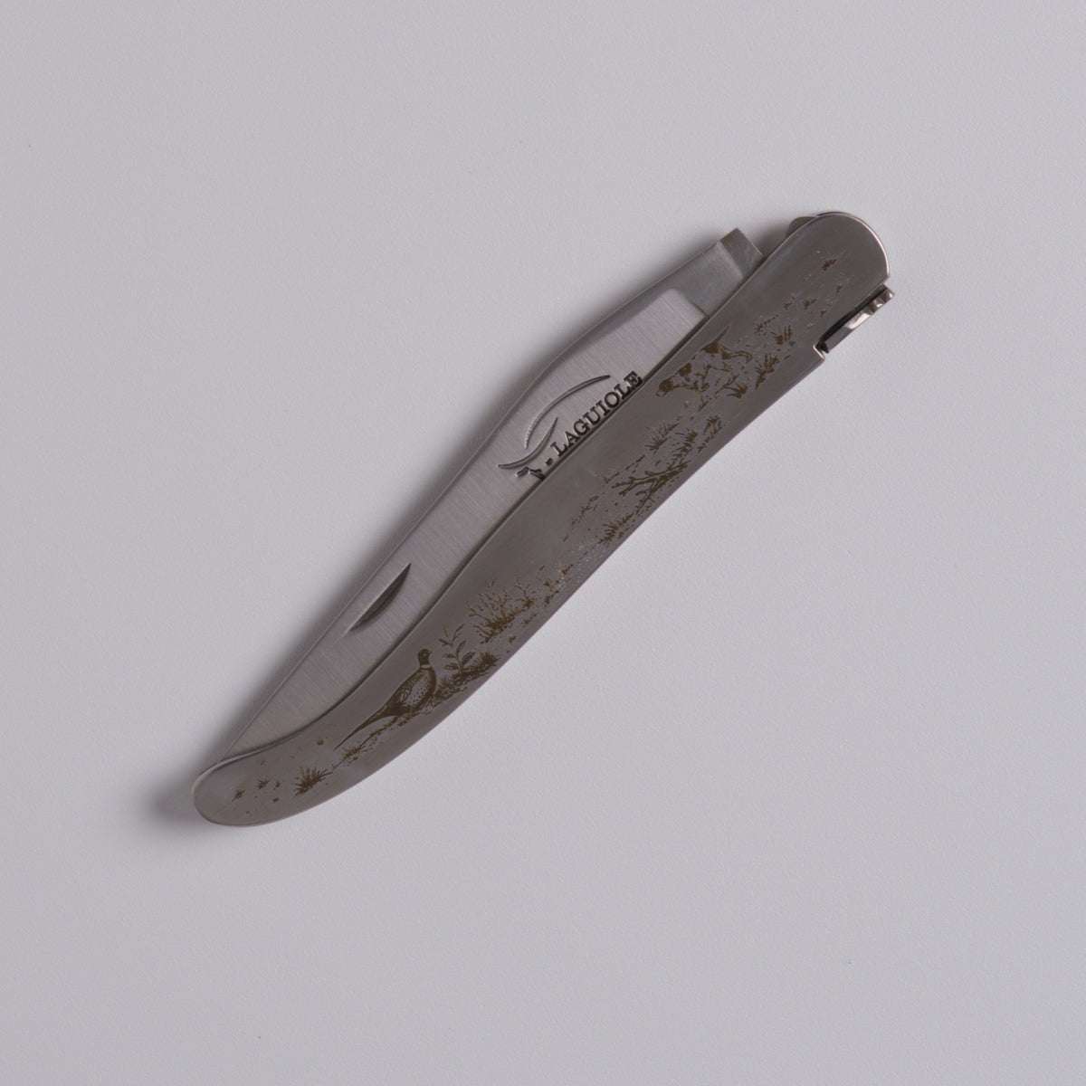 Couteau gravé chasse
